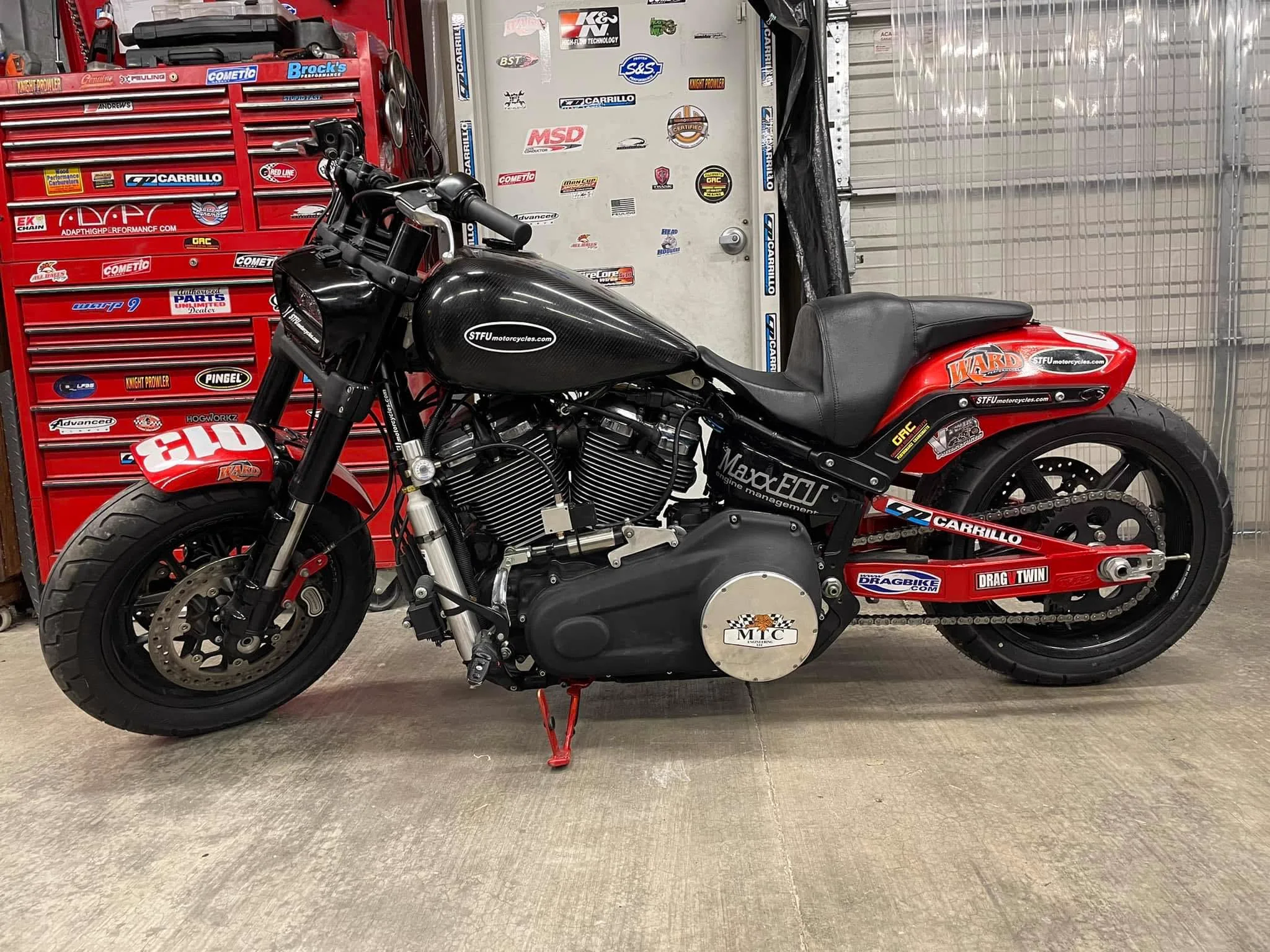 Dragbob, Scott's red and black race-prepared Harley-Davidson Fat Bob, in his workshop
